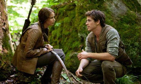 The Hunger Games: Jennifer Lawrence as Katniss Everdeen and Liam Hemsworth as Gale Hawthorne