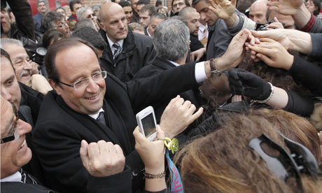 François Hollande greets supporters in the French town of Albi