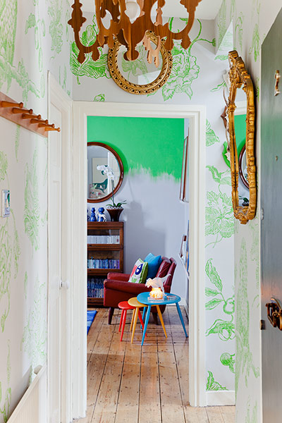 Homes Feature: Homes feature, hallway painted with green parrots