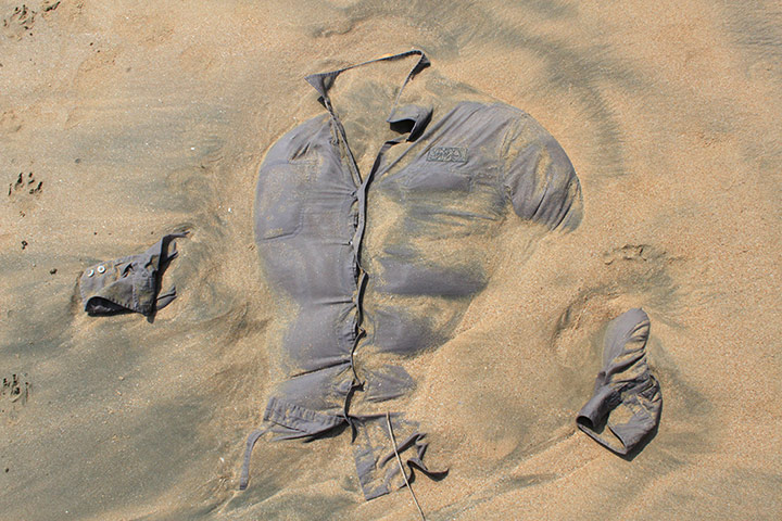 Your Pictures: Your Pictures, a discarded shirt on sand