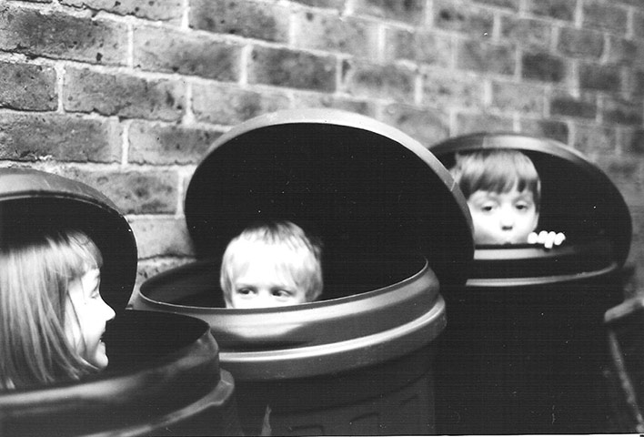 Your Pictures: Your Pictures: Three children inside rubbish bins