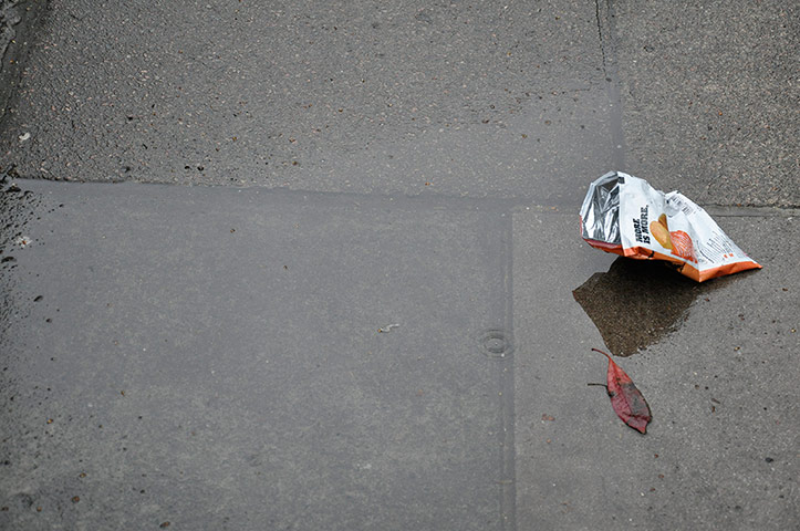 Your Pictures: Your Picture: an empty crisp packet in a puddle