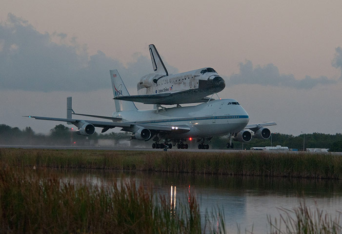 Space Shuttle: The space shuttle Discovery takes off