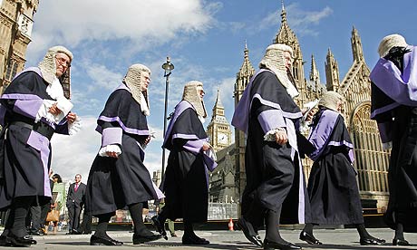 Judges wearing wigs and robes