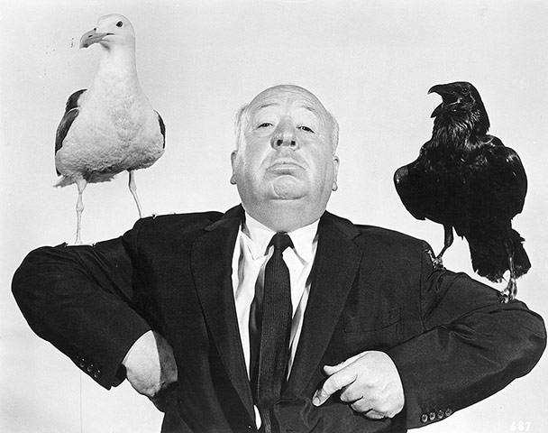 Genius of Hitchcock: Alfred Hitchcock posing for the release of The Birds