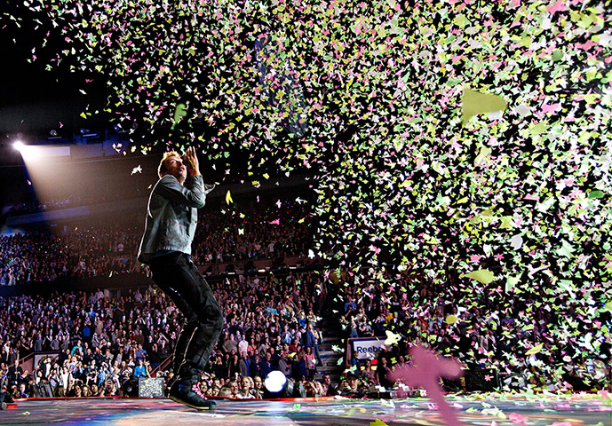 News pictures of the day: Coldplay performing in Edmonton, Alberta