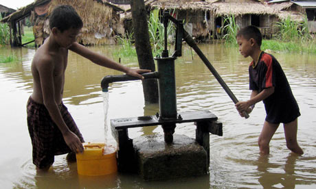 Children fetch water from a jetmatic pum
