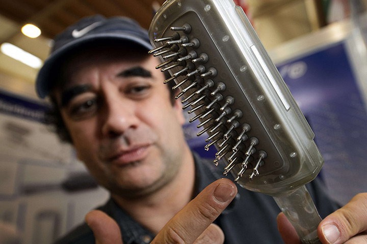 Exhibition of Inventions: a treatment hairbrush