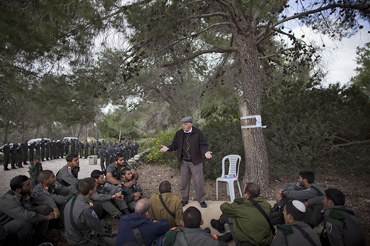 Holocaust memorial: A Holocaust survivor tells his personal testimony to Israeli border police