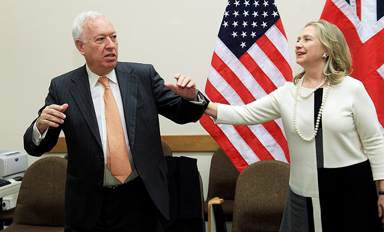 Picture Desk Live: Hillary Clinton grappling with Spain's Minister of Foreign Affairs