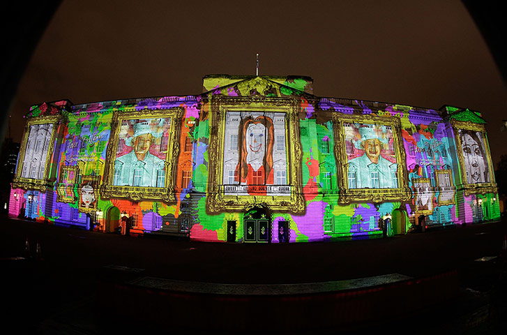 Picture desk live: Children's paintings of The Queen are projected onto Buckingham Palace