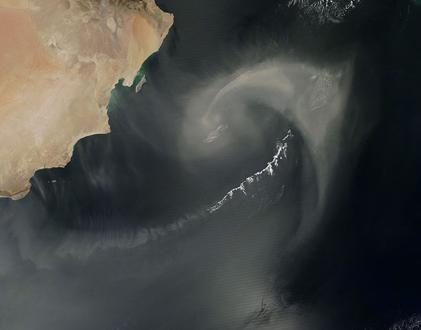 Satellite Eye on Earth: dust and clouds approximated a paisley pattern over the Arabian Sea