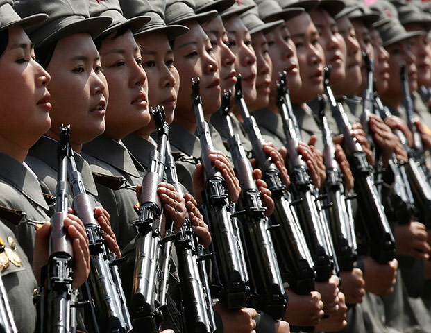 Longer view: Soldiers march past the podium during a military parade in Pyongyang