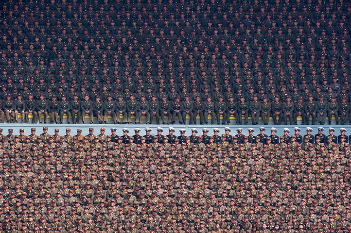Longer view: North Korean soldiers attend an official ceremony