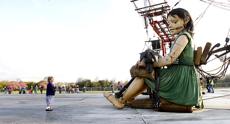 Liverpool Royal de Luxe: Emmy-Lou Hussin, 5, looks at the Little Girl Giant