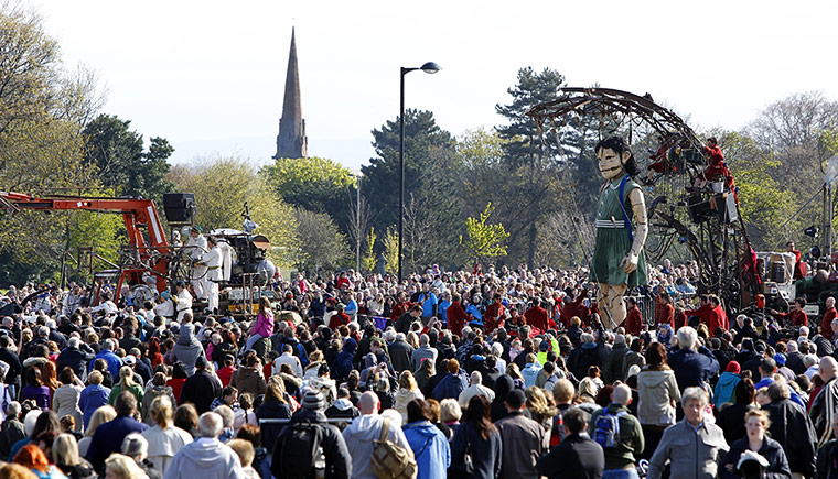 Liverpool Royal de Luxe: People gather to see the Little Girl Giant, Marionette