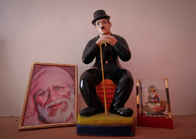 From the Agencies: A statue of Chaplin is kept next to Hindu Gods