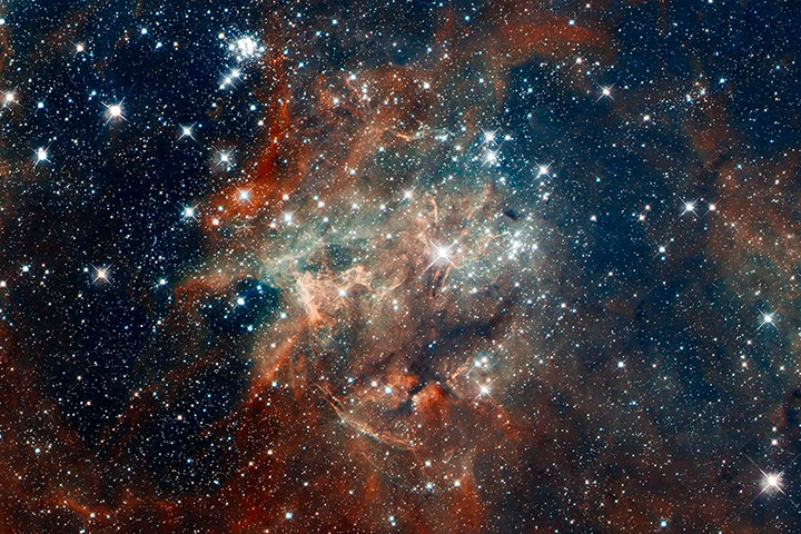 24 hours: A Nasa Hubble Space Telescope composite image shows star cluster NGC 2060
