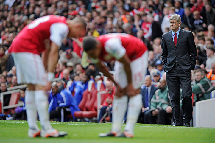 Tom Jenkins: A grim Arsene Wenger looks towards his players 