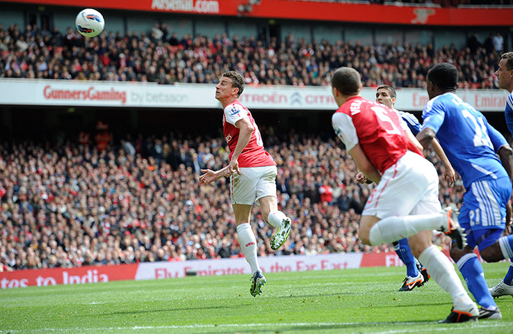 Tom Jenkins: Laurent Koscielny header hits the bar in the first half.