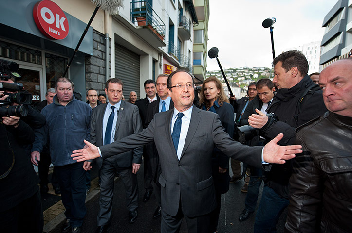 French elections: Socialist Party candidate Francois Hollande leaves the polling office