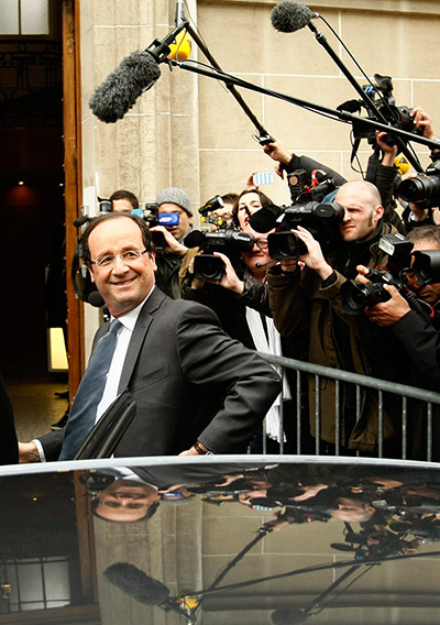 Picture desk live: French Socialist party candidate Francois Hollande arrives at campaign HQ