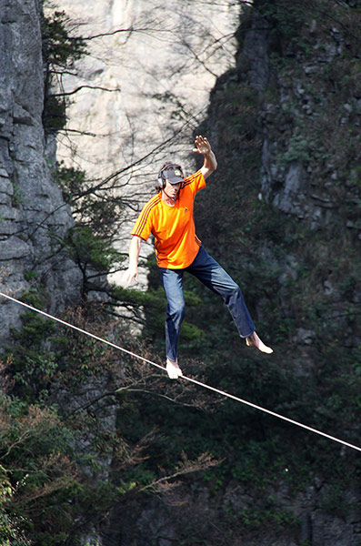 Picture desk live: Dean Potter Walks Rope Over Enshi Grand Canyon