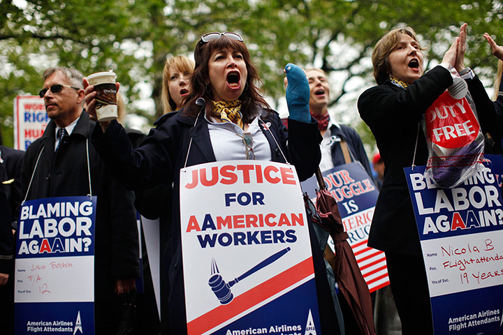 Picture desk live: American Airlines flight attendants demonstrate over job cuts