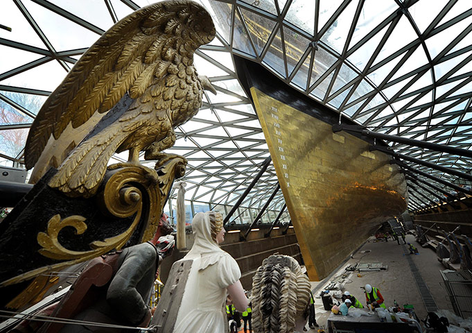 Cutty Sark: Conservators work in the dry berth under the Cutty Sark 