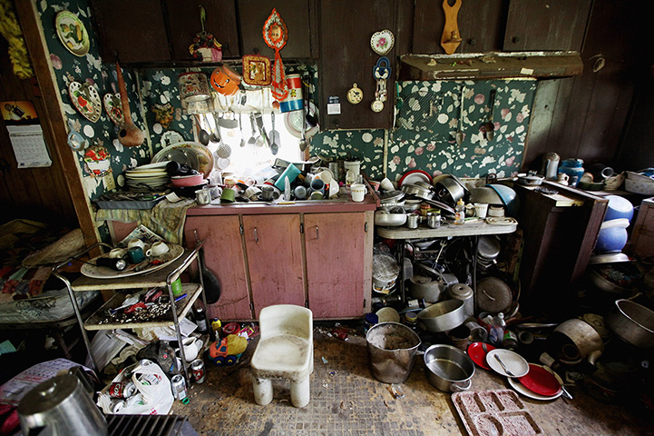 Booneville, Kentucky: Former chimney sweeper Mose Noble's kitchen is seen in Owsley County