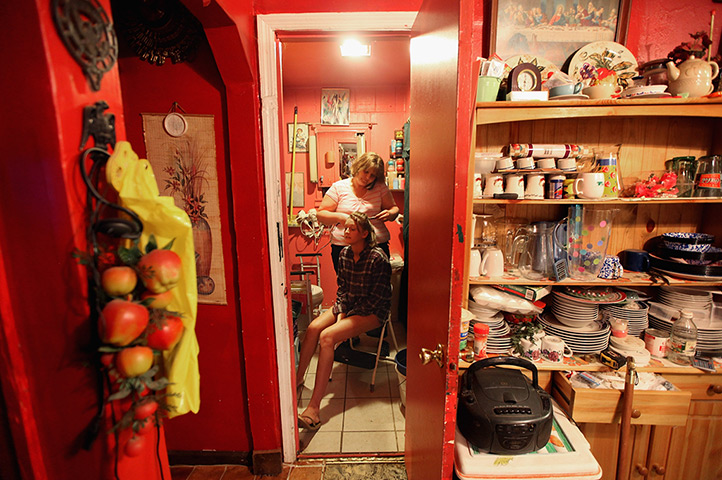 Booneville, Kentucky: Drucilla Smith prepares for the Owsley County High School prom