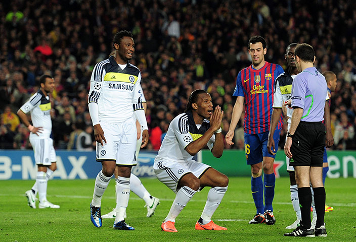 Barcelona v Chelsea: Didier Drogba of Chelsea pleads with Referee Cuneyt Cakir 