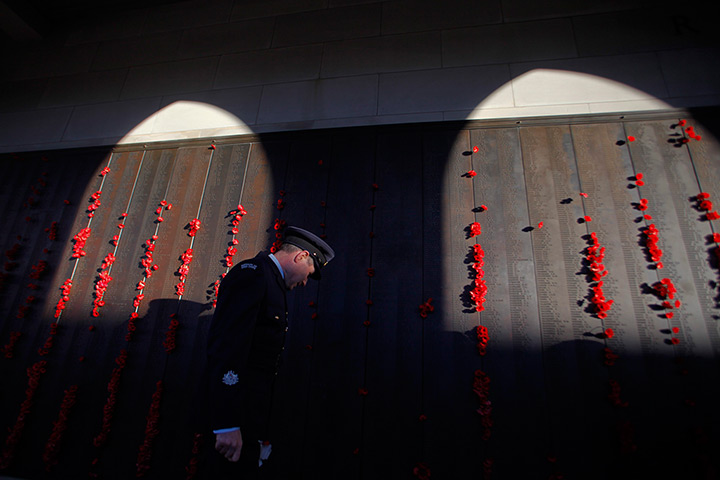 Anzac Day: A soldier visits the Roll of Honour at the Australian War Memorial Canberra