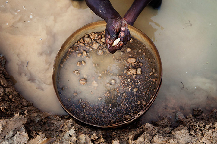 Sierra Leone after Taylor: An artisanal miner pans for diamonds in the town of Koidu