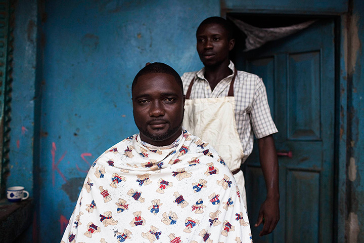 Sierra Leone after Taylor: A man has his weekly haircut in the city of Makeni 
