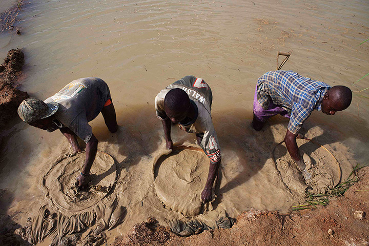 Sierra Leone after Taylor: Artisanal miners pan for diamonds, which fuelled the 1991-2002 civil war