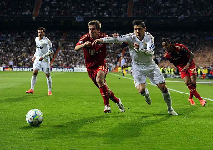 Real Madrid v Bayern: Philipp Lahm tussles with Ronaldo