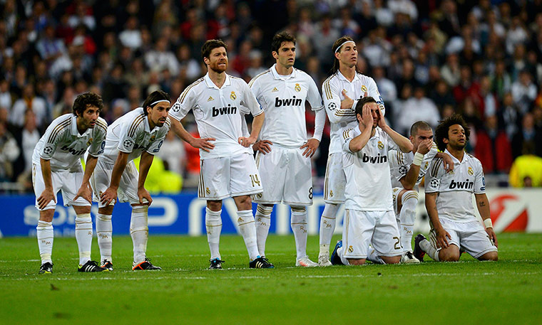 Real Madrid v Bayern: Real Madrid's players react during the penalty shootout
