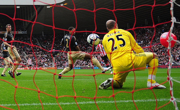 Barclays photo awards: Sunderland's Darren Bent scores against Liverpool