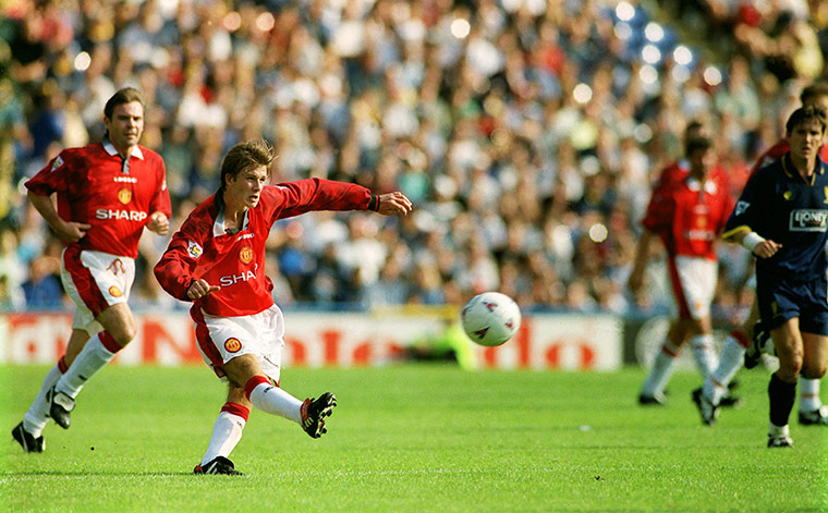 Barclays photo awards: Manchester United's David Beckham scores from his own half 