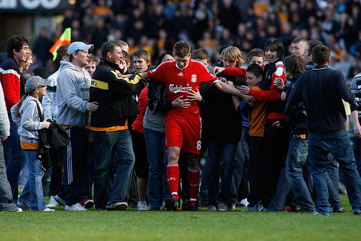 Barclays photo awards: Liverpool's Steven Gerrard is surrounded by fans