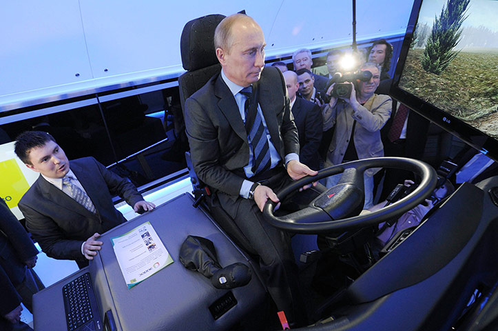 Picture Desk Live: Putin drives a locomotive simulator