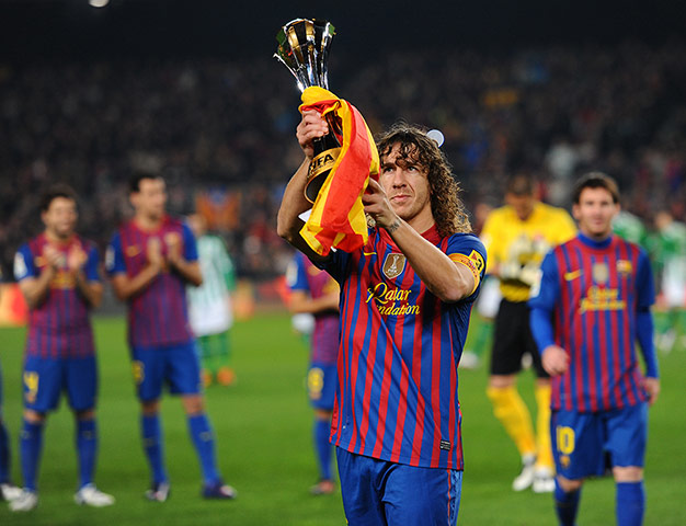 Guardiola resigns: Barcelona's captain Carles Puyol shows