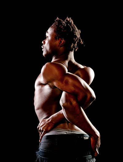 Your Pictures: Twist: Contortionist twisting his arms behind his back