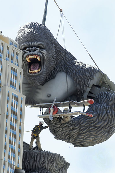 Week in film: Workers hoist the top of King Kong into position on Hollywood Wax Museum