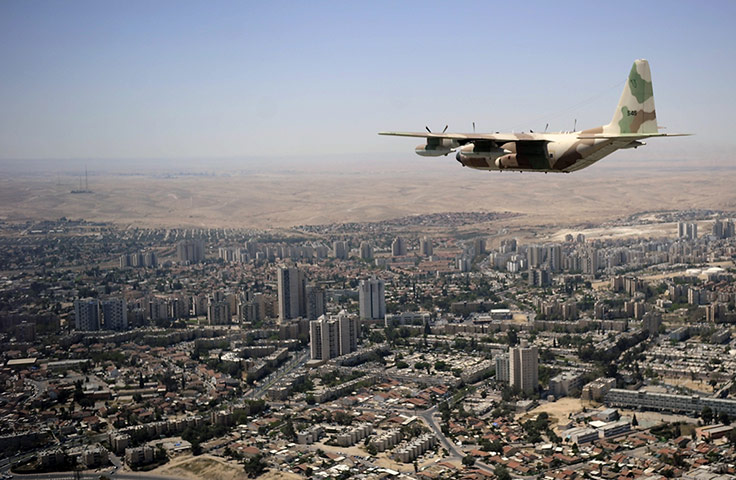 24 hours: Be'er Sheva, Isreal: An Israeli military plane flies south of Hebron