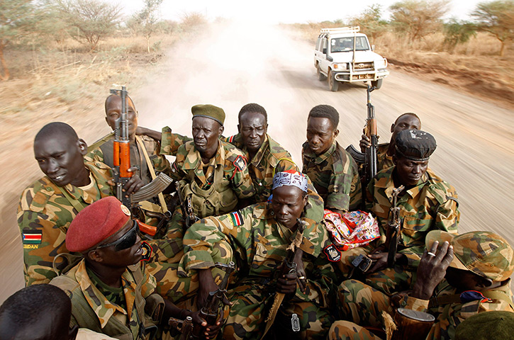 South Sudan: South Sudan's army (SPLA) soldiers drive in a truck in Panakuach
