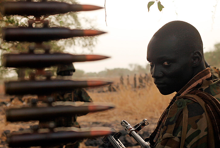 South Sudan: A South Sudan's army (SPLA) soldier sits in a truck in Panakuach