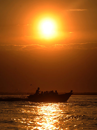 24 hours: Herat province, Afghanistan: Afghans enjoy a ride on a motorboat