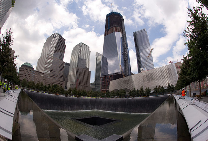 World Trade Centre: 4 August 2011: A view of the south pool waterfall with the Freedom Tower